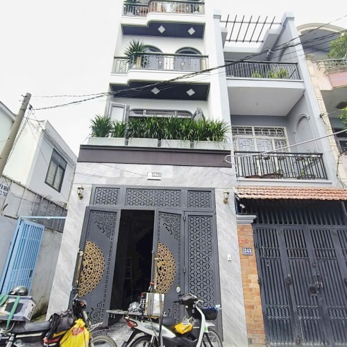 Bán nhà 1 trệt 4 lầu 124/  đường Phan Huy Ích, phường 15, Quận Tân Bình, HCM